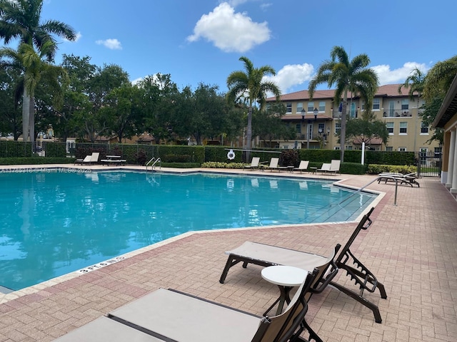 964 SW 147th Ave Unit 2606, Pembroke Pines, FL 33027 - community pool with a patio