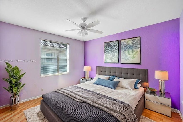 11257 NW 51st St, Coral Springs, FL 33076 - bedroom with baseboards, a ceiling fan, and wood finished floors