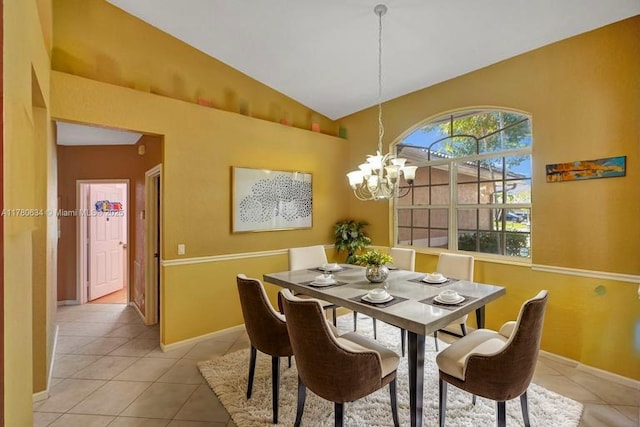 11257 NW 51st St, Coral Springs, FL 33076 - dining room with light tile patterned floors, baseboards, high vaulted ceiling, and an inviting chandelier
