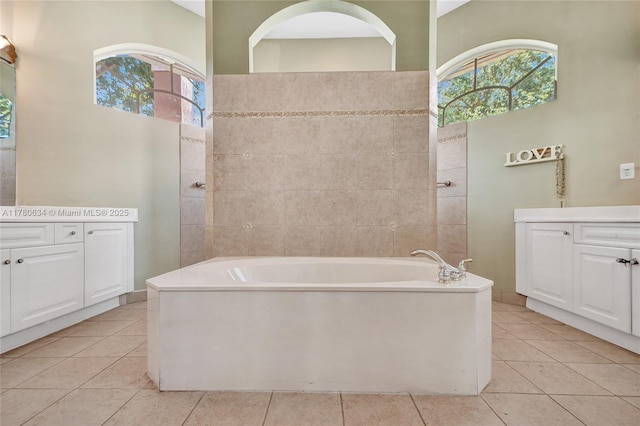 11257 NW 51st St, Coral Springs, FL 33076 - full bath with a garden tub, vanity, and tile patterned flooring