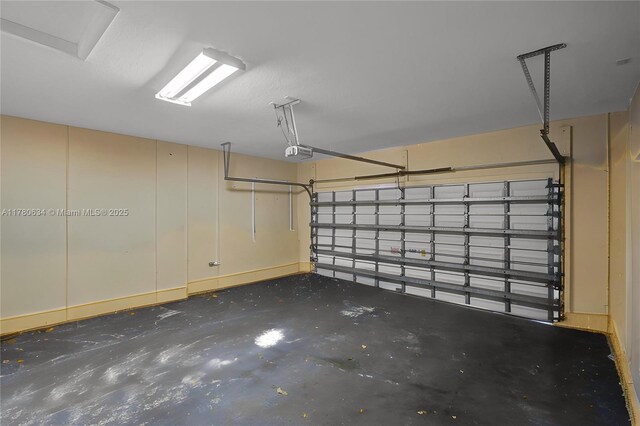 11257 NW 51st St, Coral Springs, FL 33076 - garage featuring a garage door opener