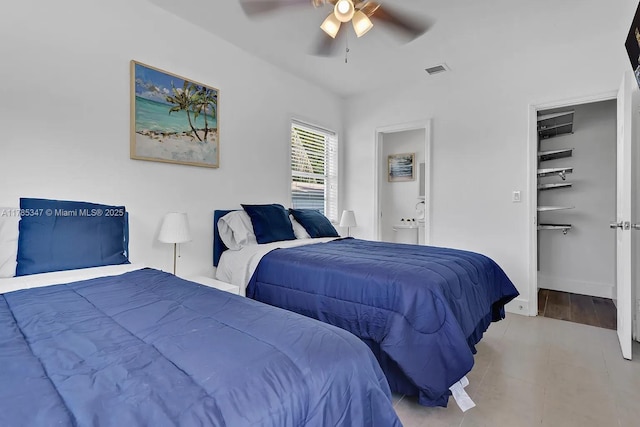 bedroom with visible vents and a ceiling fan