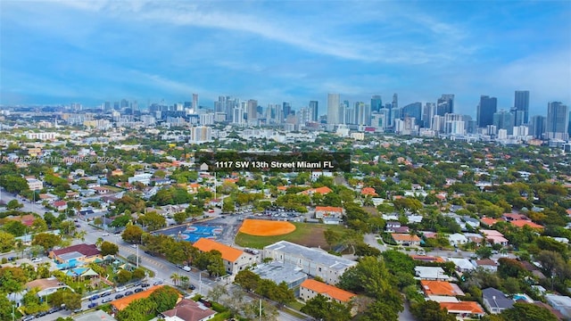drone / aerial view featuring a city view