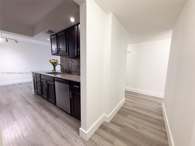 1601 S Flagler Dr Unit 211O, West Palm Beach, FL 33401 - kitchen with backsplash, stainless steel dishwasher, visible vents, and light wood finished floors