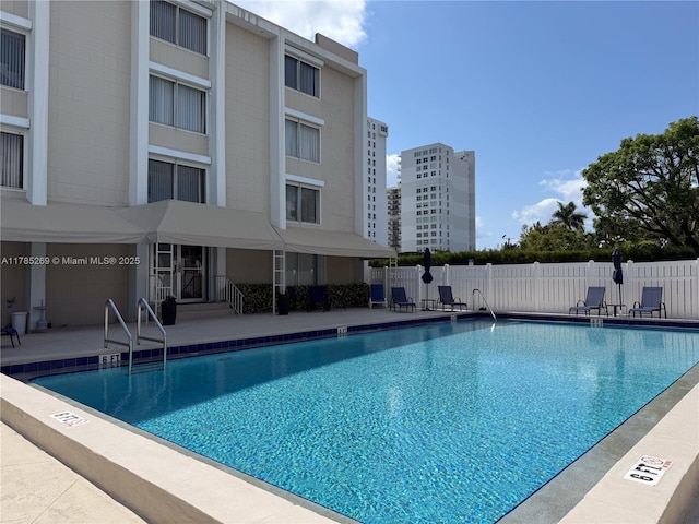 1601 S Flagler Dr Unit 211O, West Palm Beach, FL 33401 - community pool featuring fence and a patio