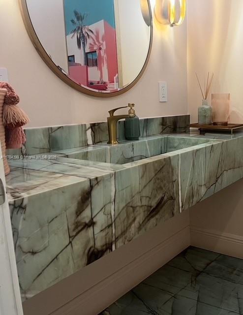 1141 NE 90th St, Miami, FL 33138 - bathroom with marble finish floor and a sink