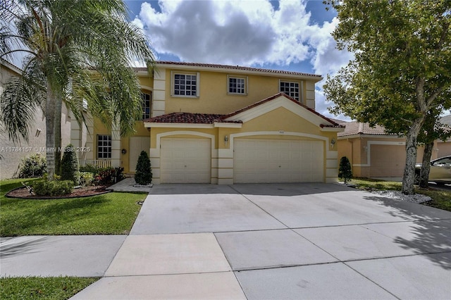 4322 Fox Ridge Dr, Weston, FL 33331 - mediterranean / spanish-style house with driveway, stucco siding, and an attached garage