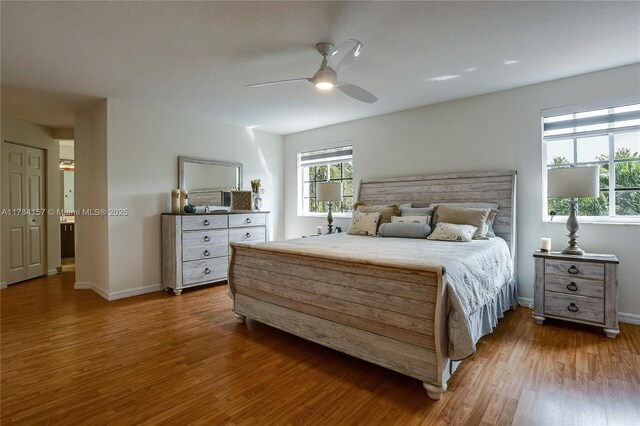 4322 Fox Ridge Dr, Weston, FL 33331 - bedroom featuring wood finished floors, baseboards, and ceiling fan