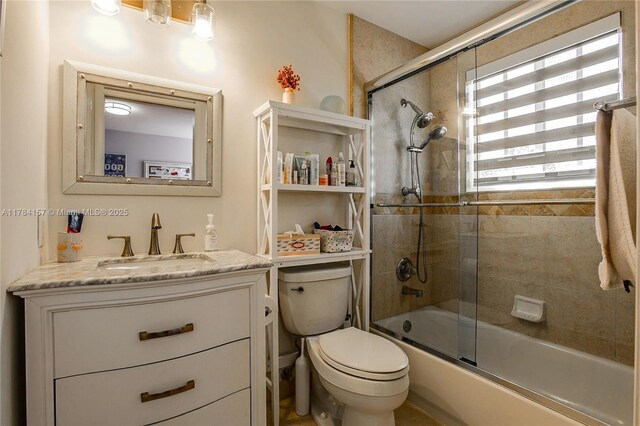 4322 Fox Ridge Dr, Weston, FL 33331 - full bathroom with combined bath / shower with glass door, toilet, and vanity