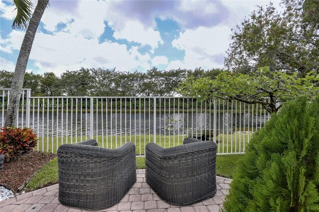 4322 Fox Ridge Dr, Weston, FL 33331 - view of patio / terrace with a water view