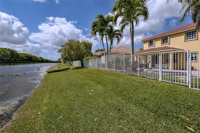 4322 Fox Ridge Dr, Weston, FL 33331 - view of yard featuring a water view and a swimming pool