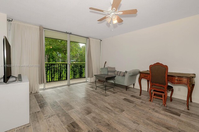 3401 N Country Club Dr Unit 117, Aventura, FL 33180 - interior space featuring wood finished floors and a ceiling fan