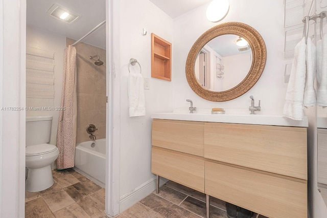 3401 N Country Club Dr Unit 117, Aventura, FL 33180 - bathroom with toilet, a sink, shower / tub combo with curtain, double vanity, and baseboards