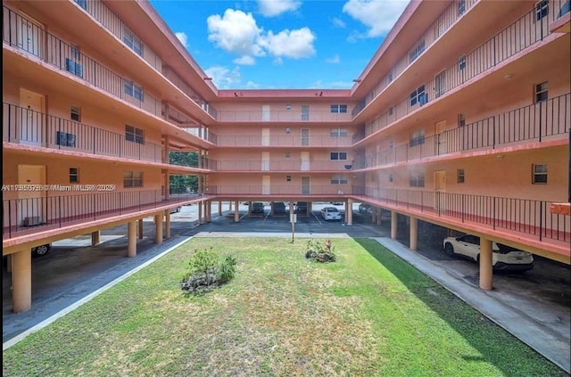 1810 W 56th St Unit 3127, Hialeah, FL 33012 - surrounding community featuring a parking lot
