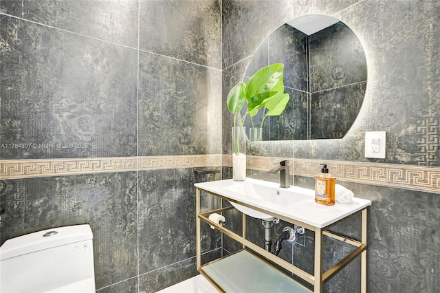 half bathroom with toilet and tile walls