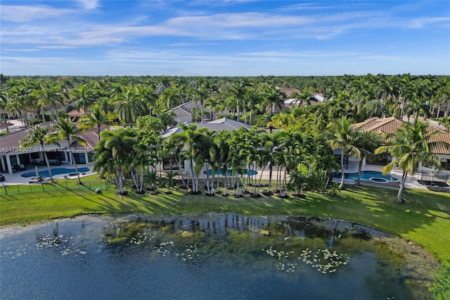 drone / aerial view with a residential view and a water view