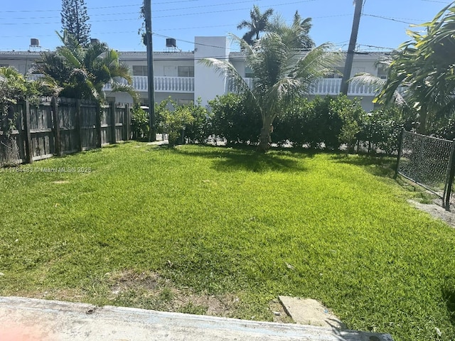 view of yard with fence