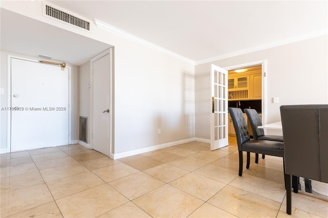 18011 Biscayne Blvd Unit 902, Aventura, FL 33160 - dining room with ornamental molding, light tile patterned floors, and baseboards