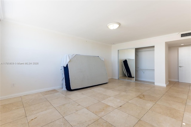 18011 Biscayne Blvd Unit 902, Aventura, FL 33160 - unfurnished bedroom with crown molding, a closet, and baseboards
