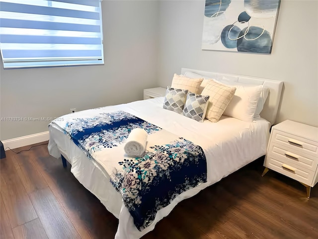 1398 Harbor View Dr, Fort Myers, FL 33917 - bedroom featuring dark wood-type flooring and baseboards