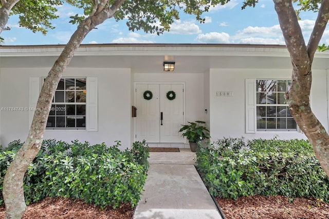 15801 SW 77th Ct, Palmetto Bay, FL 33157 - property entrance with stucco siding and covered porch