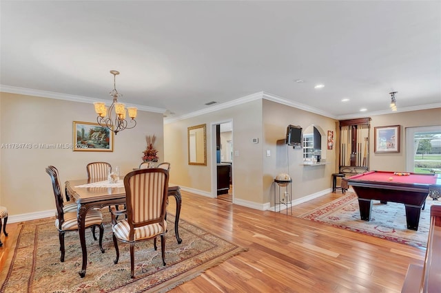 15801 SW 77th Ct, Palmetto Bay, FL 33157 - dining space with billiards, light wood finished floors, a chandelier, baseboards, and crown molding