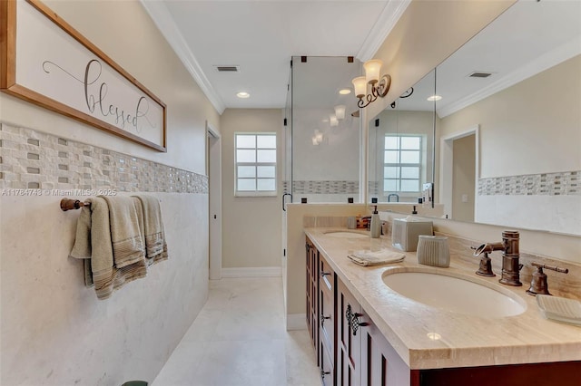 15801 SW 77th Ct, Palmetto Bay, FL 33157 - full bathroom with healthy amount of natural light, ornamental molding, double vanity, and tile walls