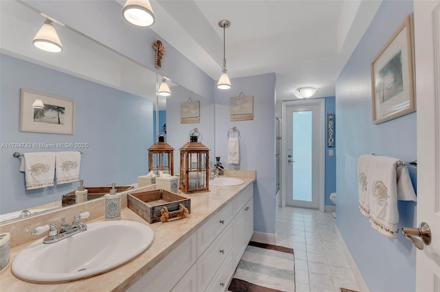 15801 SW 77th Ct, Palmetto Bay, FL 33157 - full bath featuring double vanity, toilet, tile patterned floors, an enclosed shower, and baseboards