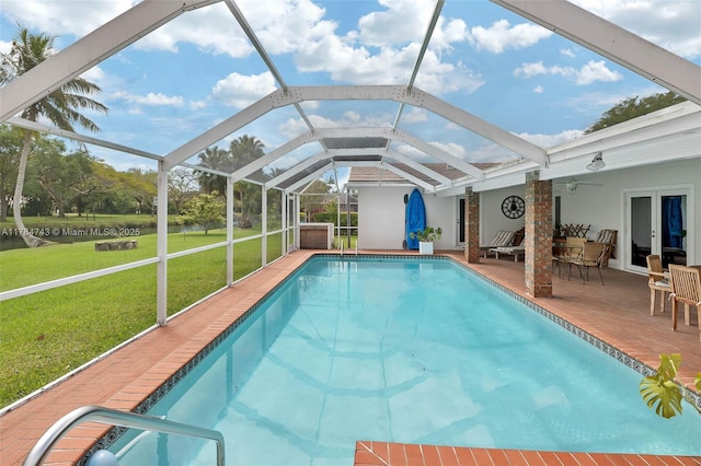 15801 SW 77th Ct, Palmetto Bay, FL 33157 - swimming pool featuring a yard, ceiling fan, a patio area, and glass enclosure