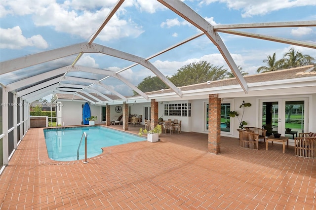 15801 SW 77th Ct, Palmetto Bay, FL 33157 - swimming pool with a patio area, french doors, a lanai, an outdoor hangout area, and outdoor dining area