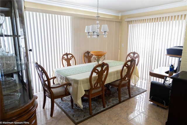 dining space with an inviting chandelier and crown molding