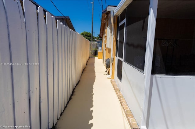 view of side of property with fence