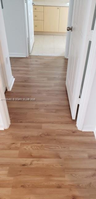 1919 Van Buren St Unit 520A, Hollywood, FL 33020 - hall with light wood finished floors and baseboards