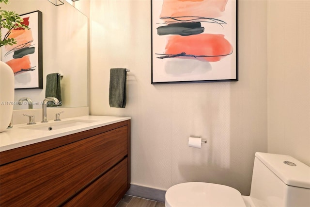3581 E Glencoe St Unit 309, Miami, FL 33133 - bathroom featuring vanity and toilet