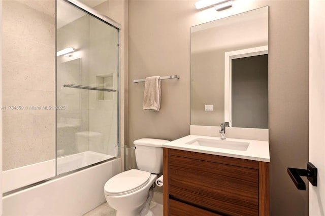 3581 E Glencoe St Unit 309, Miami, FL 33133 - bathroom with vanity, toilet, and shower / bath combination with glass door