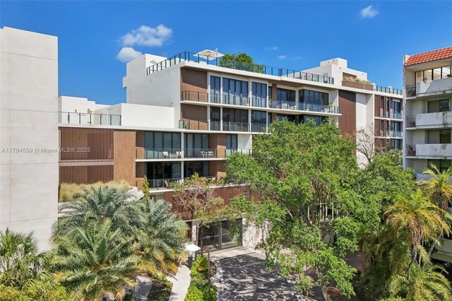 3581 E Glencoe St Unit 309, Miami, FL 33133 - view of apartment building / complex