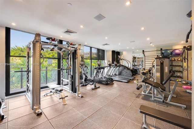 3581 E Glencoe St Unit 309, Miami, FL 33133 - workout area with expansive windows, healthy amount of natural light, and recessed lighting