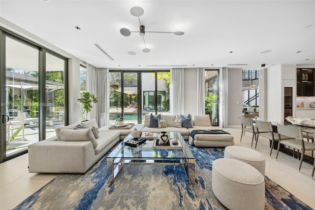 8825 SW 64th Ct, Pinecrest, FL 33156 - living area with a wall of windows