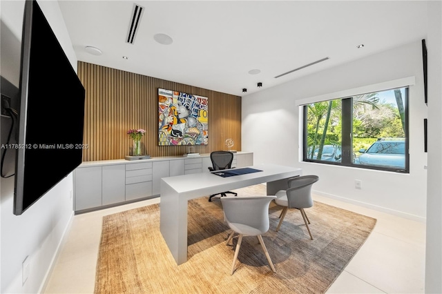 8825 SW 64th Ct, Pinecrest, FL 33156 - home office with baseboards and an accent wall