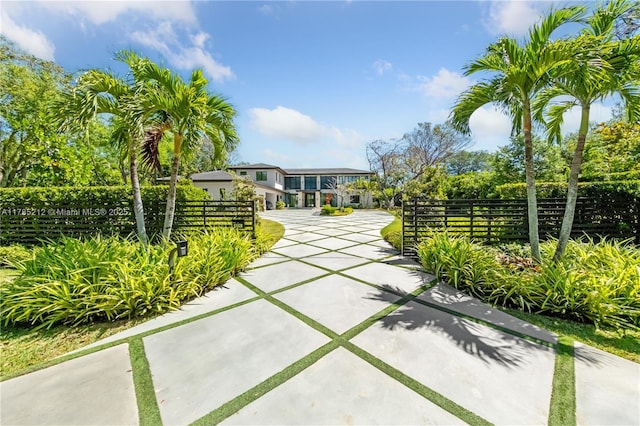 8825 SW 64th Ct, Pinecrest, FL 33156 - view of home's community with concrete driveway