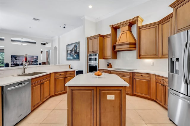 kitchen with visible vents, light tile patterned floors, stainless steel appliances, and custom range hood