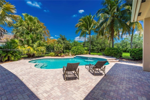 outdoor pool with a patio