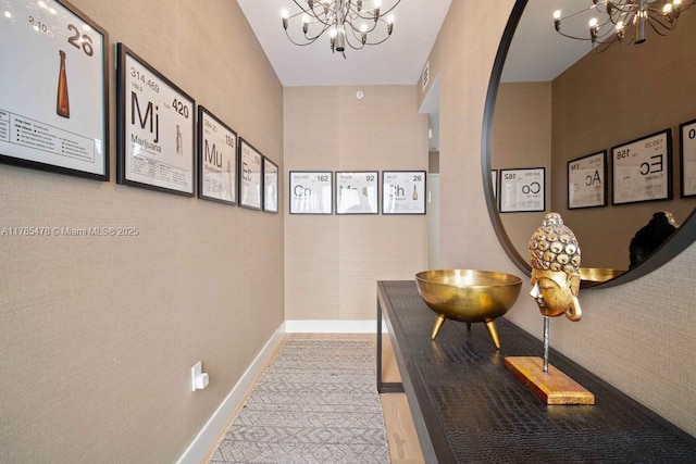 65 N Shore Dr Unit 31C, Miami Beach, FL 33141 - corridor with a chandelier and carpet flooring