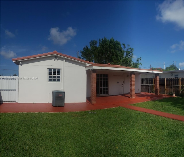3130 SW 65th Ave, Miami, FL 33155 - rear view of house with a patio and stucco siding