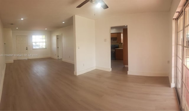 3130 SW 65th Ave, Miami, FL 33155 - spare room featuring light wood-style flooring, ceiling fan, and recessed lighting