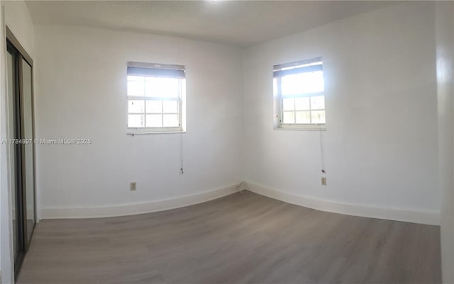3130 SW 65th Ave, Miami, FL 33155 - empty room with wood finished floors and baseboards