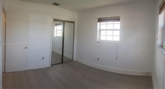 3130 SW 65th Ave, Miami, FL 33155 - unfurnished bedroom with wood finished floors and a closet
