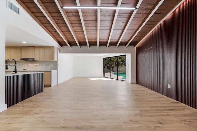 15201 SW 87th Ct, Palmetto Bay, FL 33157 - unfurnished living room with visible vents, wooden ceiling, lofted ceiling with beams, a sink, and light wood finished floors