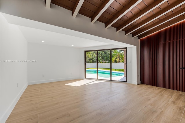 15201 SW 87th Ct, Palmetto Bay, FL 33157 - unfurnished room featuring wood ceiling, lofted ceiling with beams, baseboards, and light wood-type flooring