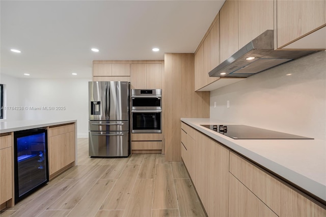 15201 SW 87th Ct, Palmetto Bay, FL 33157 - kitchen featuring appliances with stainless steel finishes, exhaust hood, beverage cooler, and light brown cabinetry